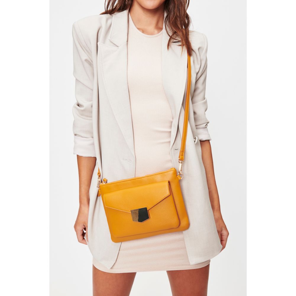 Woman wearing Mustard Moda Luxe Amari Crossbody 842017128434 View 1 | Mustard
