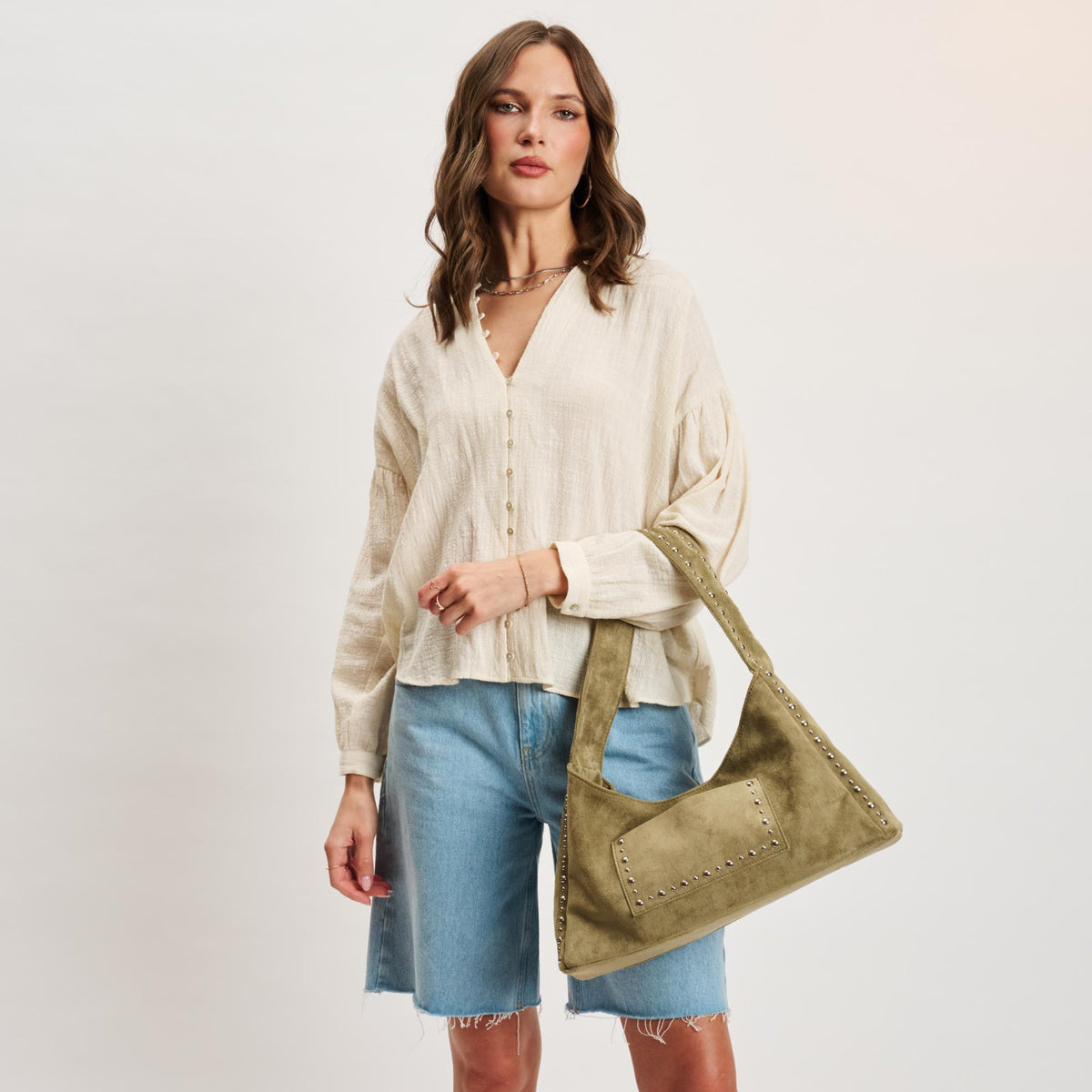 Woman wearing Sage Moda Luxe Dahlia Hobo 842017140641 View 1 | Sage