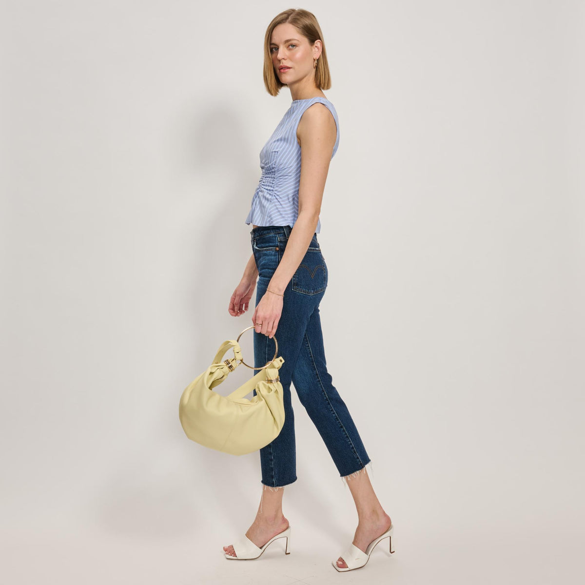 Woman wearing Butter Moda Luxe Azura Crossbody 842017138020 View 4 | Butter