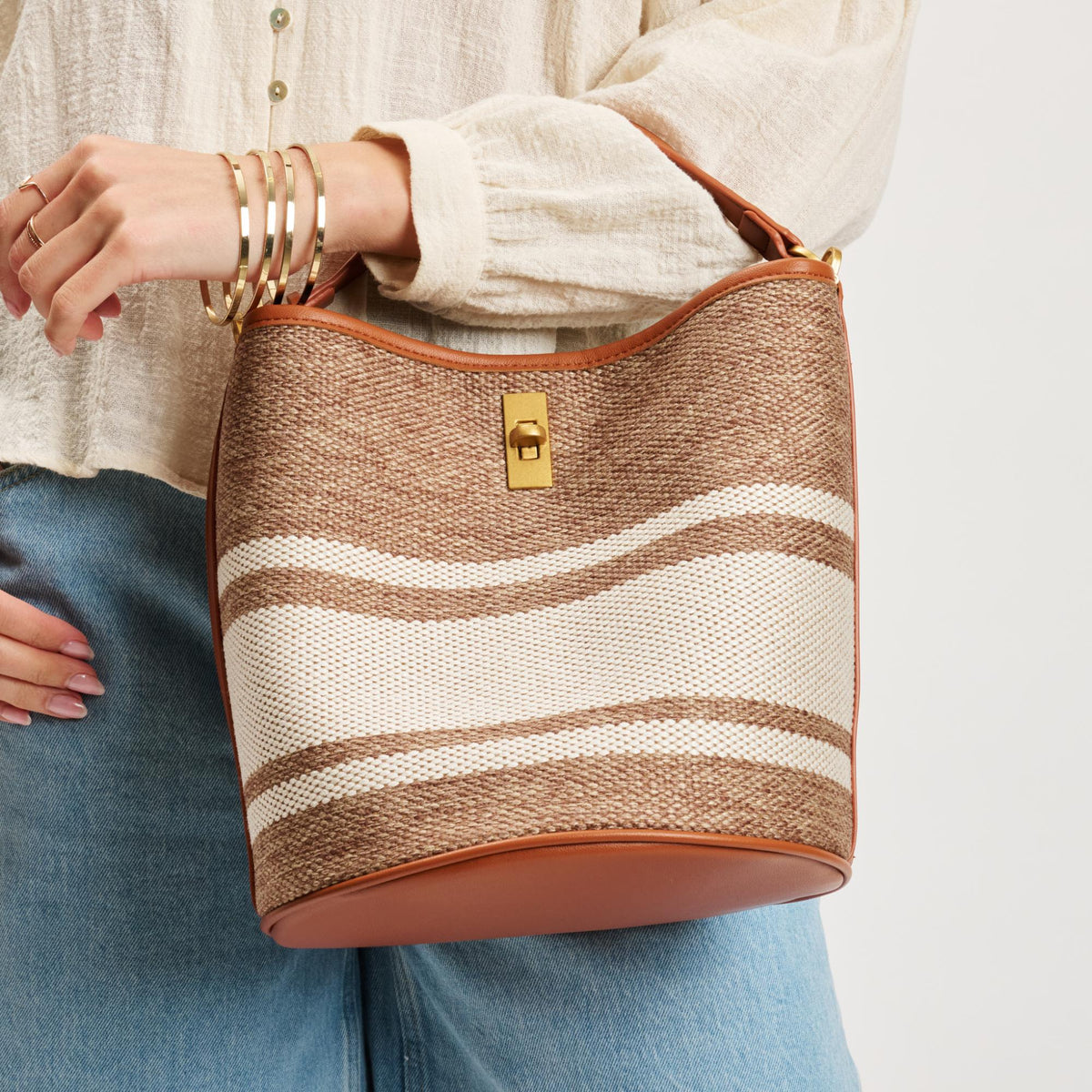 Woman wearing Tan Moda Luxe Mirella Bucket 842017141402 View 2 | Tan