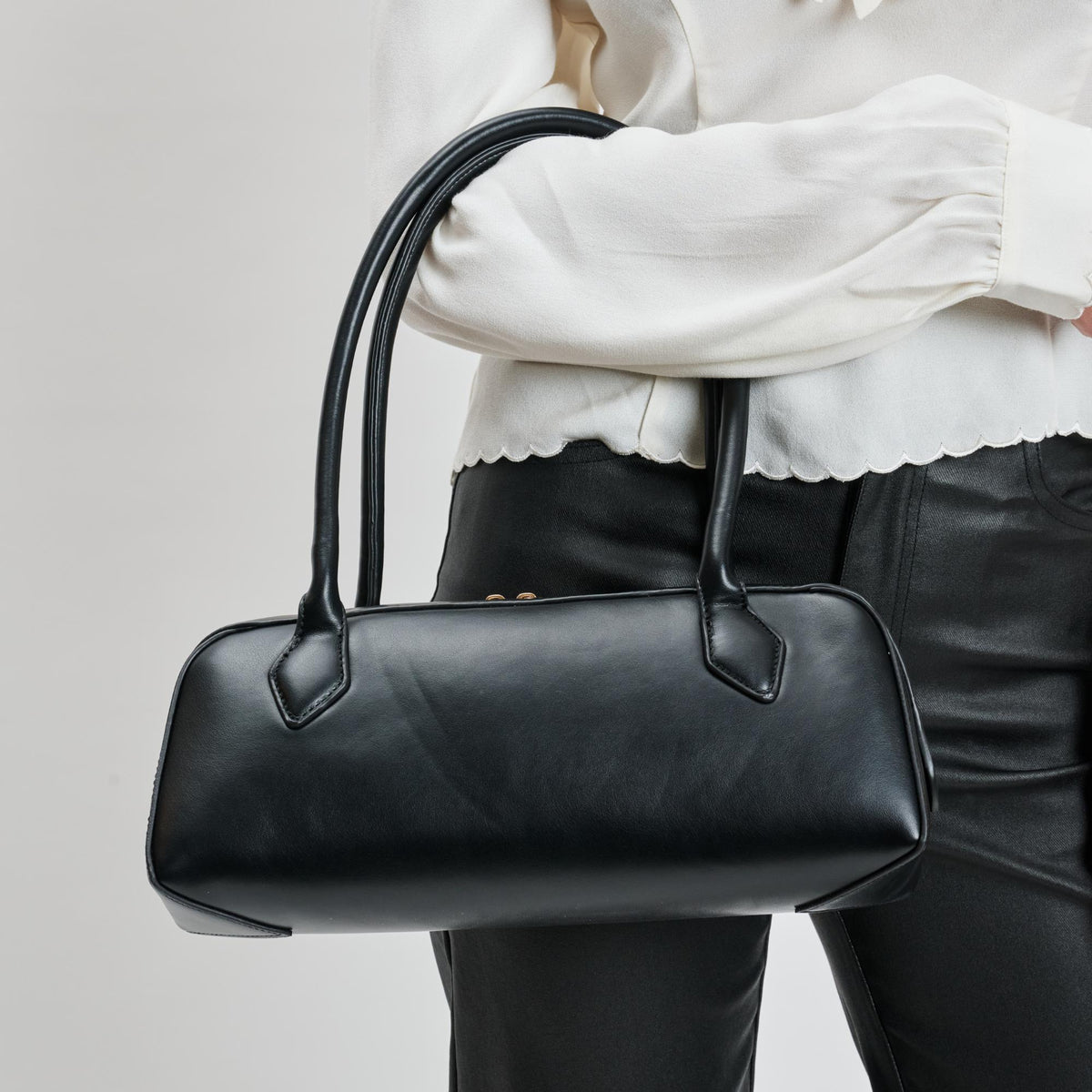Woman wearing Black Moda Luxe Betty Shoulder Bag 842017139393 View 4 | Black