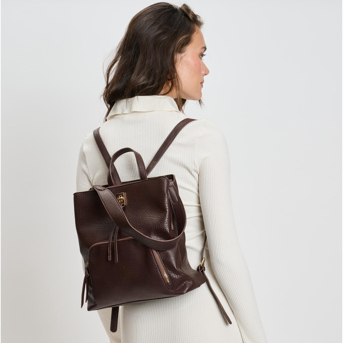 Woman wearing Espresso Moda Luxe Genevieve Backpack 842017136095 View 1 | Espresso