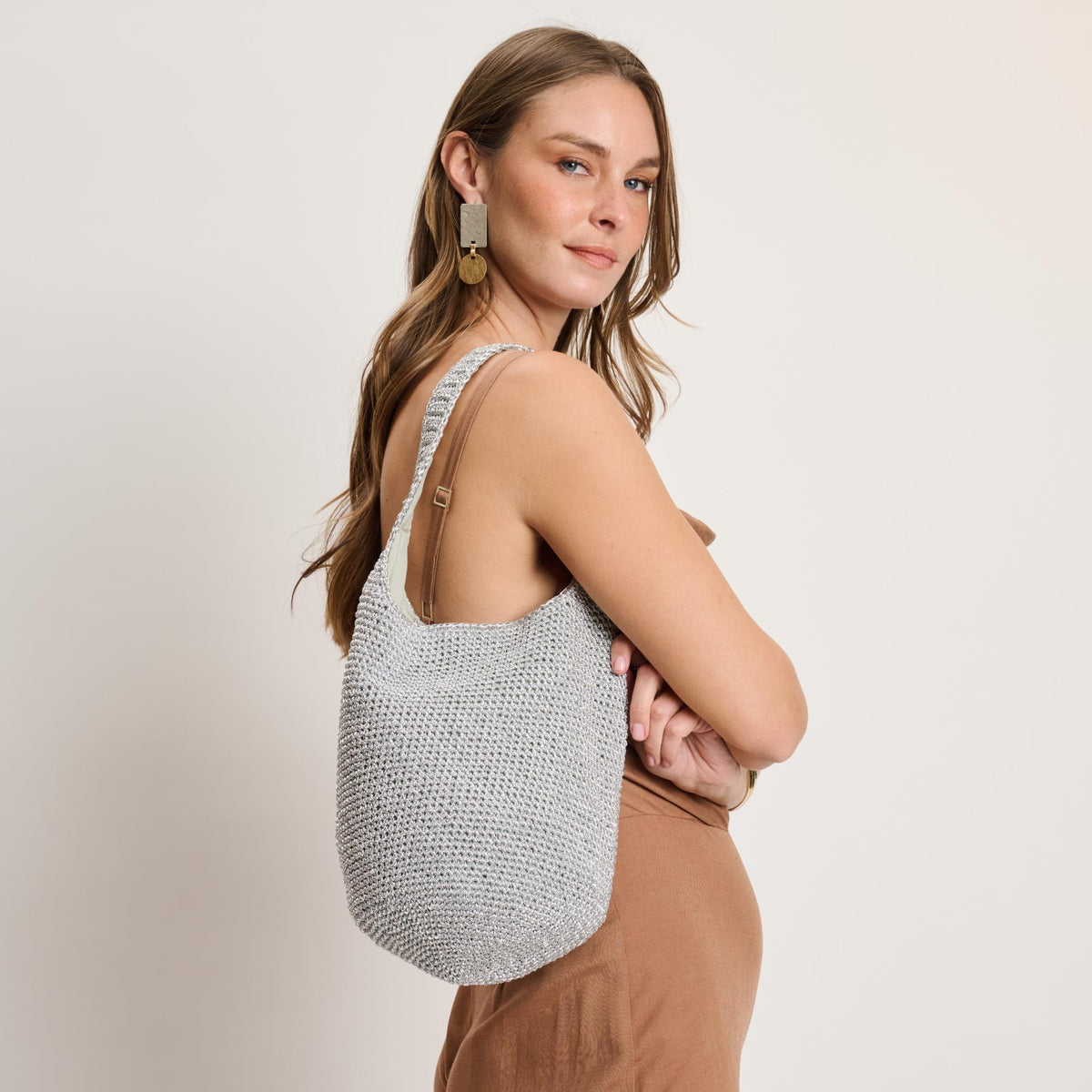 Woman wearing Silver Moda Luxe Starla Tote 842017141150 View 4 | Silver