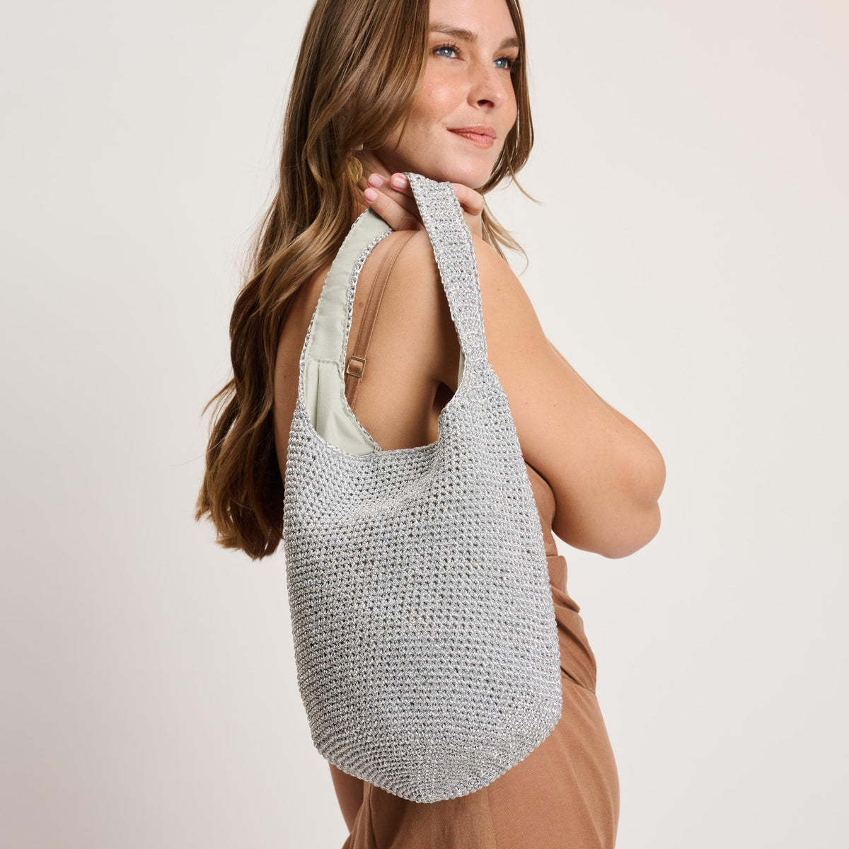 Woman wearing Silver Moda Luxe Starla Tote 842017141150 View 1 | Silver