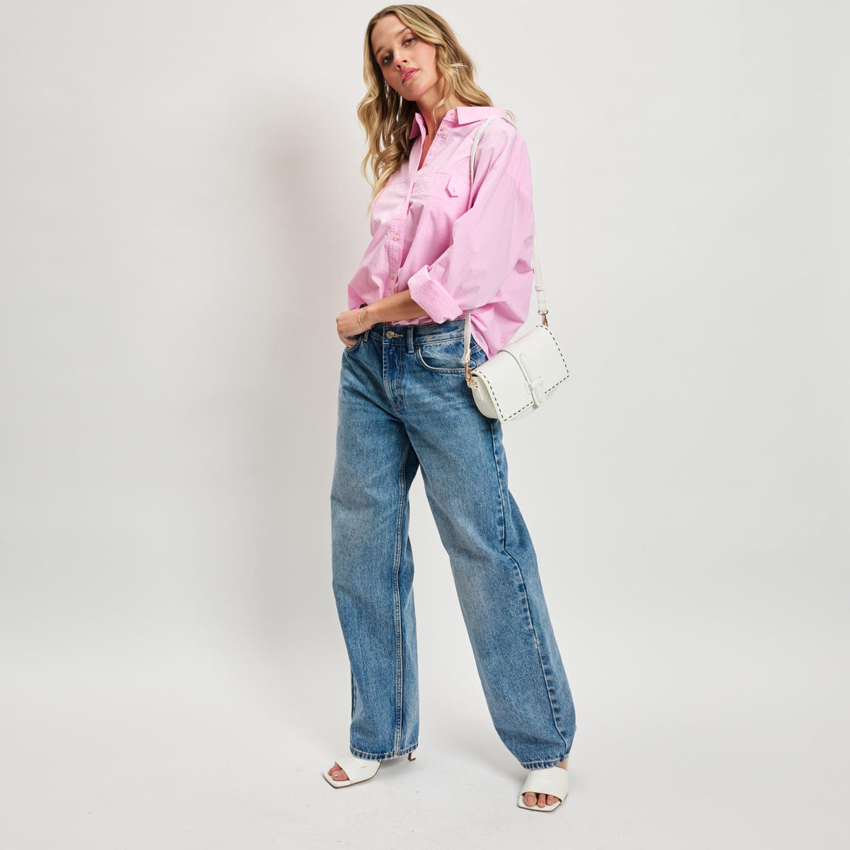 Woman wearing Off White Moda Luxe Norah Crossbody 842017133674 View 4 | Off White
