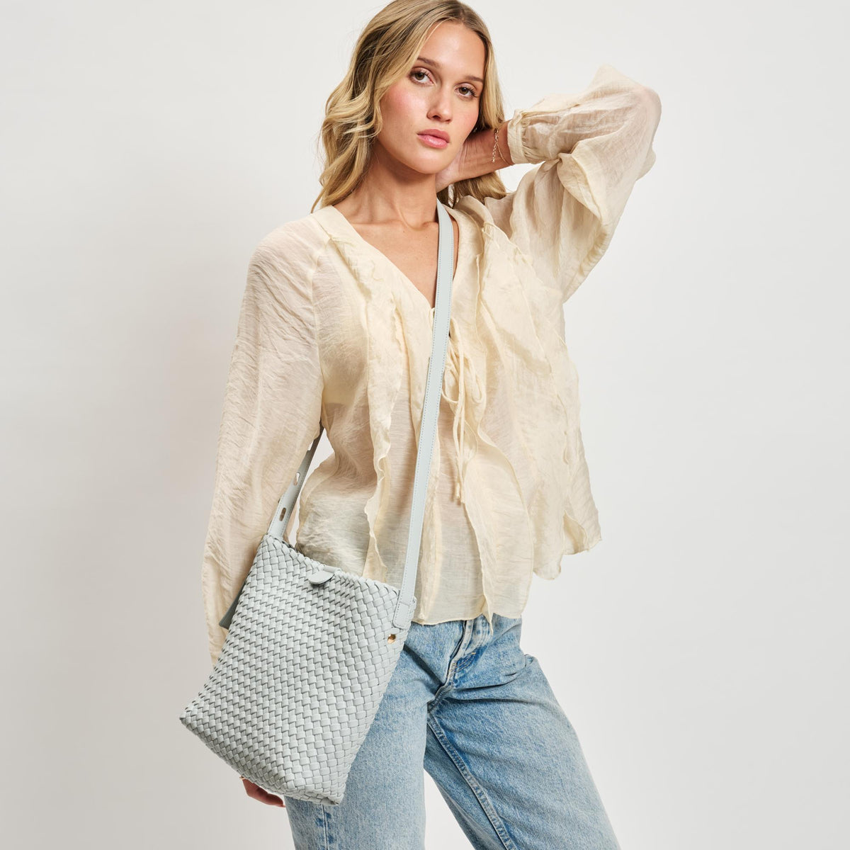 Woman wearing Ice Blue Moda Luxe Isadora Bucket 842017137344 View 2 | Ice Blue