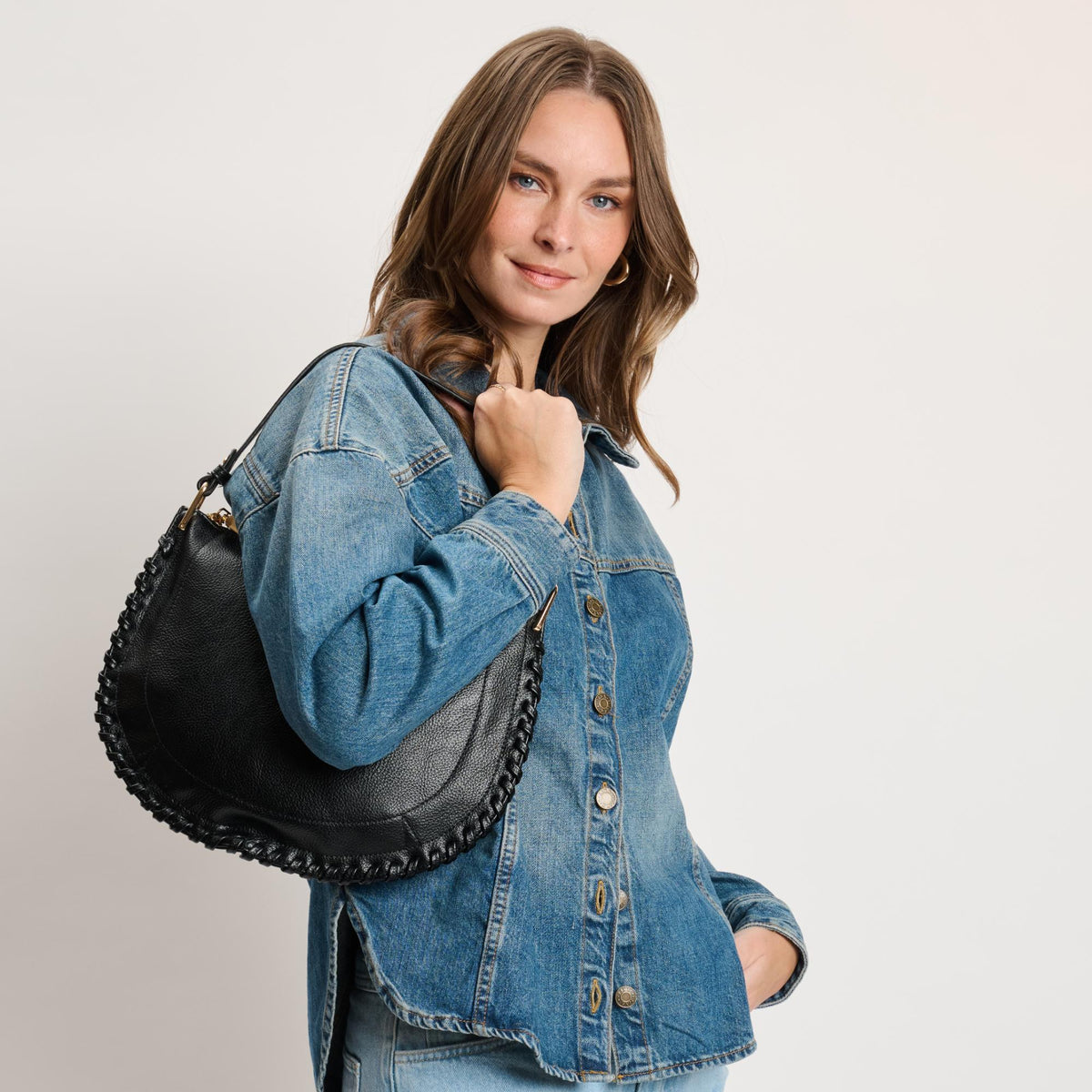 Woman wearing Black Moda Luxe Lita Hobo 842017141068 View 1 | Black