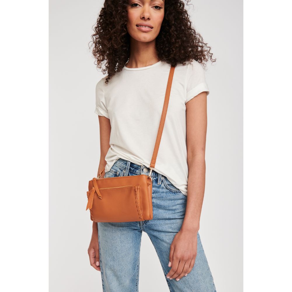 Woman wearing Tan Moda Luxe Kenzie Crossbody 842017127314 View 1 | Tan