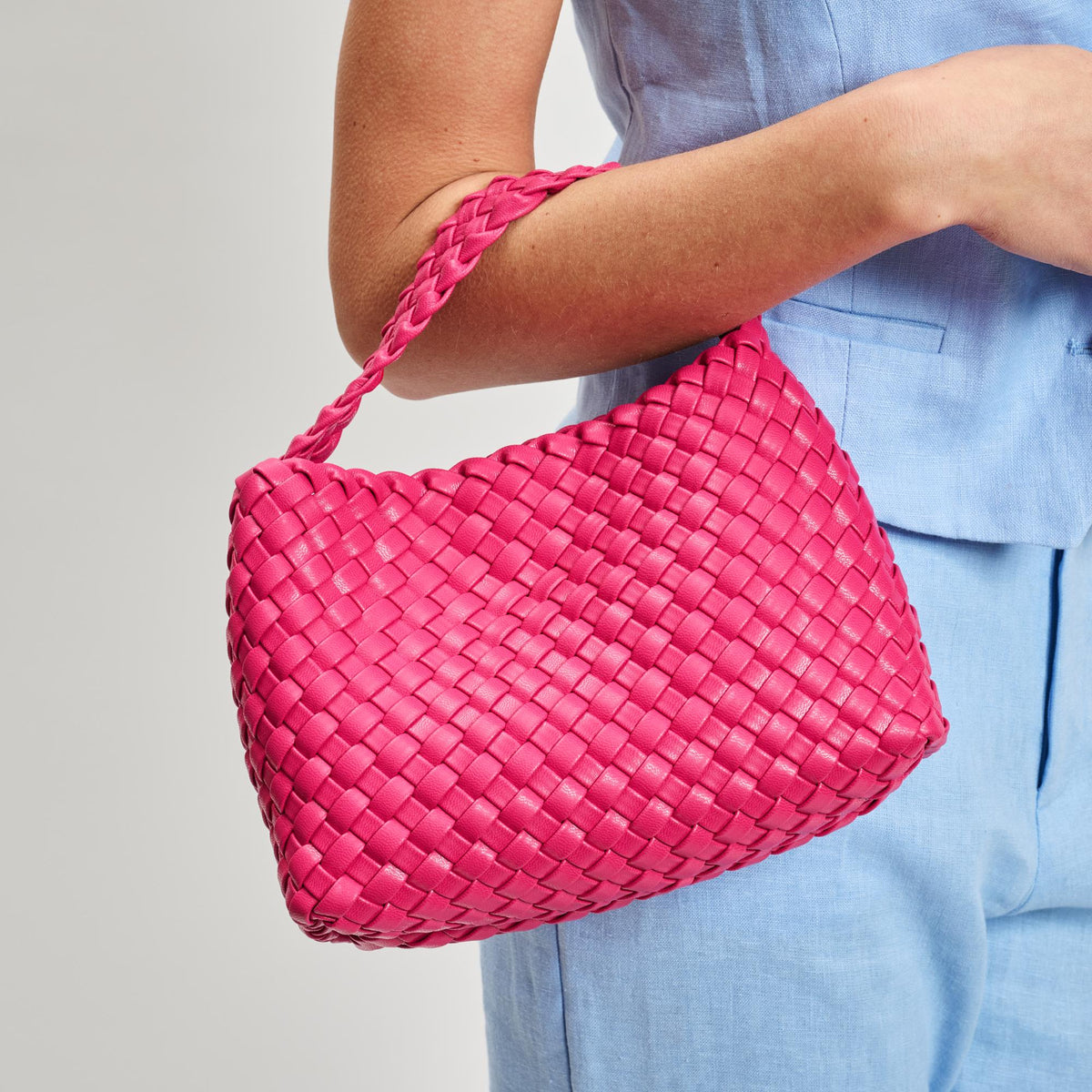 Woman wearing Fuchsia Moda Luxe Kaia Crossbody 842017137405 View 1 | Fuchsia