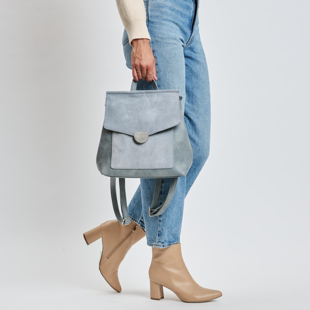 Woman wearing Light Blue Moda Luxe Lynn Backpack 842017139867 View 4 | Light Blue