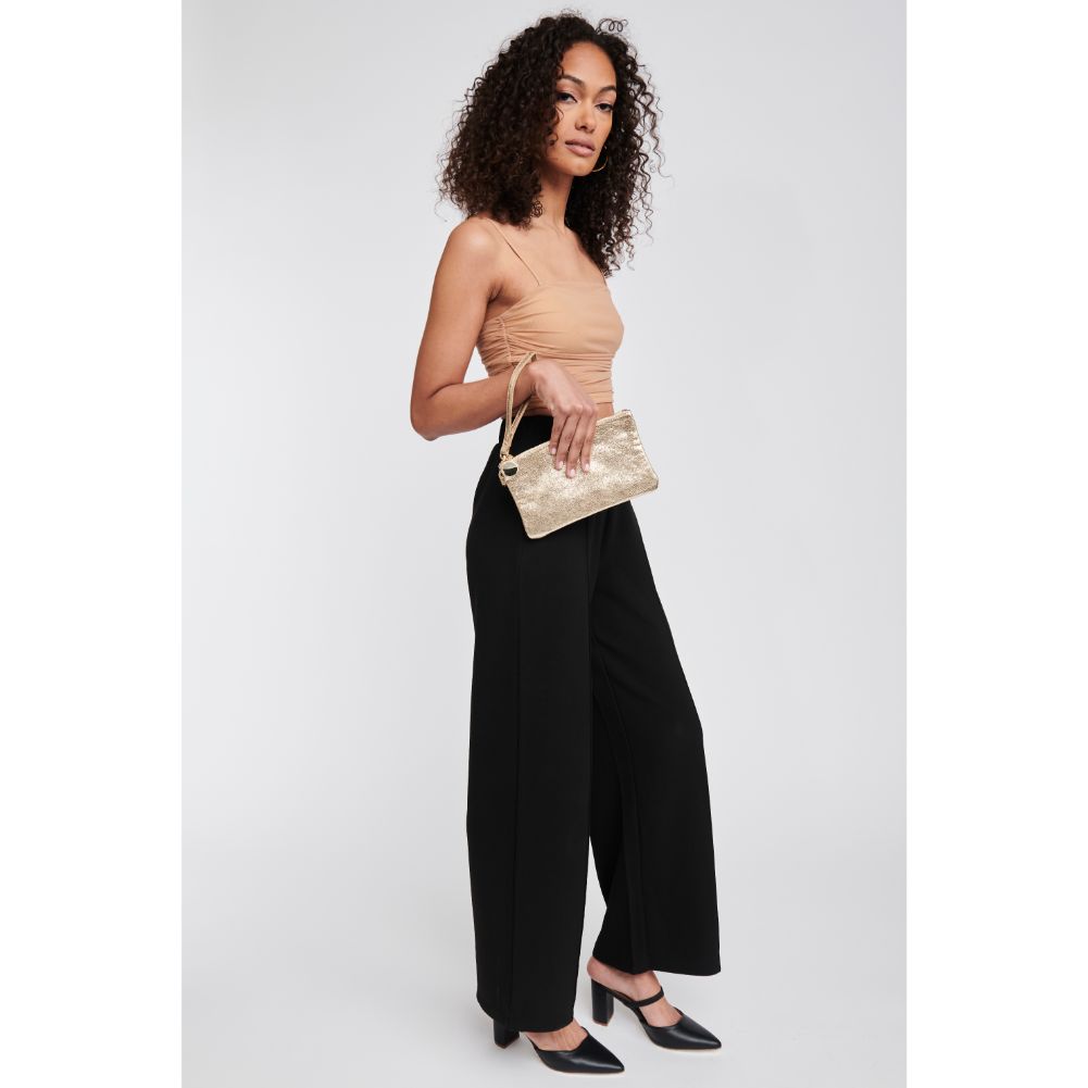 Woman wearing Gold Moda Luxe Olivia Wristlet 842017117933 View 2 | Gold