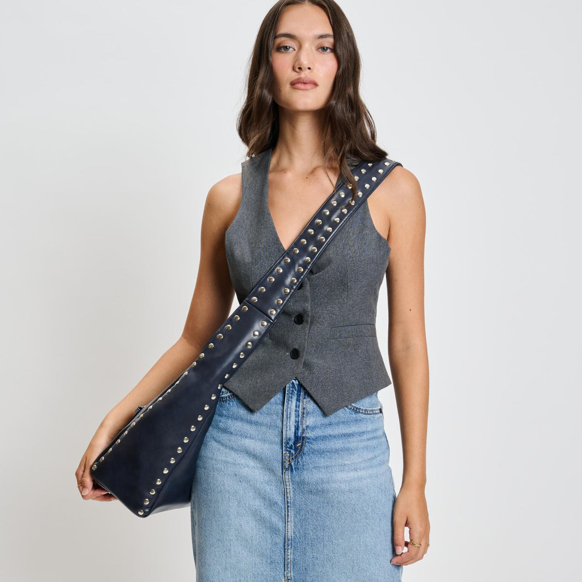 Woman wearing Navy Moda Luxe Electra Crossbody 842017136163 View 4 | Navy