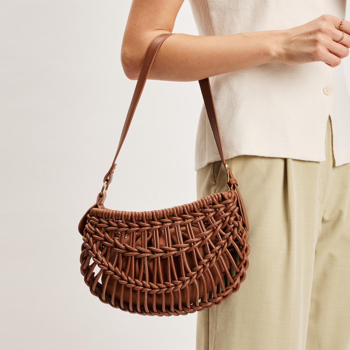 Woman wearing Cognac Moda Luxe Francesca Clutch 842017141396 View 1 | Cognac