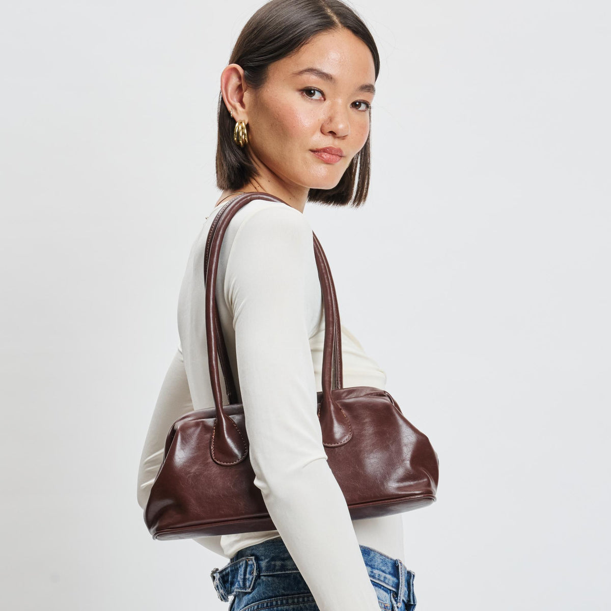 Woman wearing Chocolate Moda Luxe Ninna Shoulder Bag 842017139577 View 2 | Chocolate