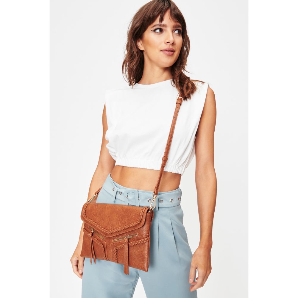 Woman wearing Cognac Moda Luxe Laurel Crossbody 842017128106 View 2 | Cognac