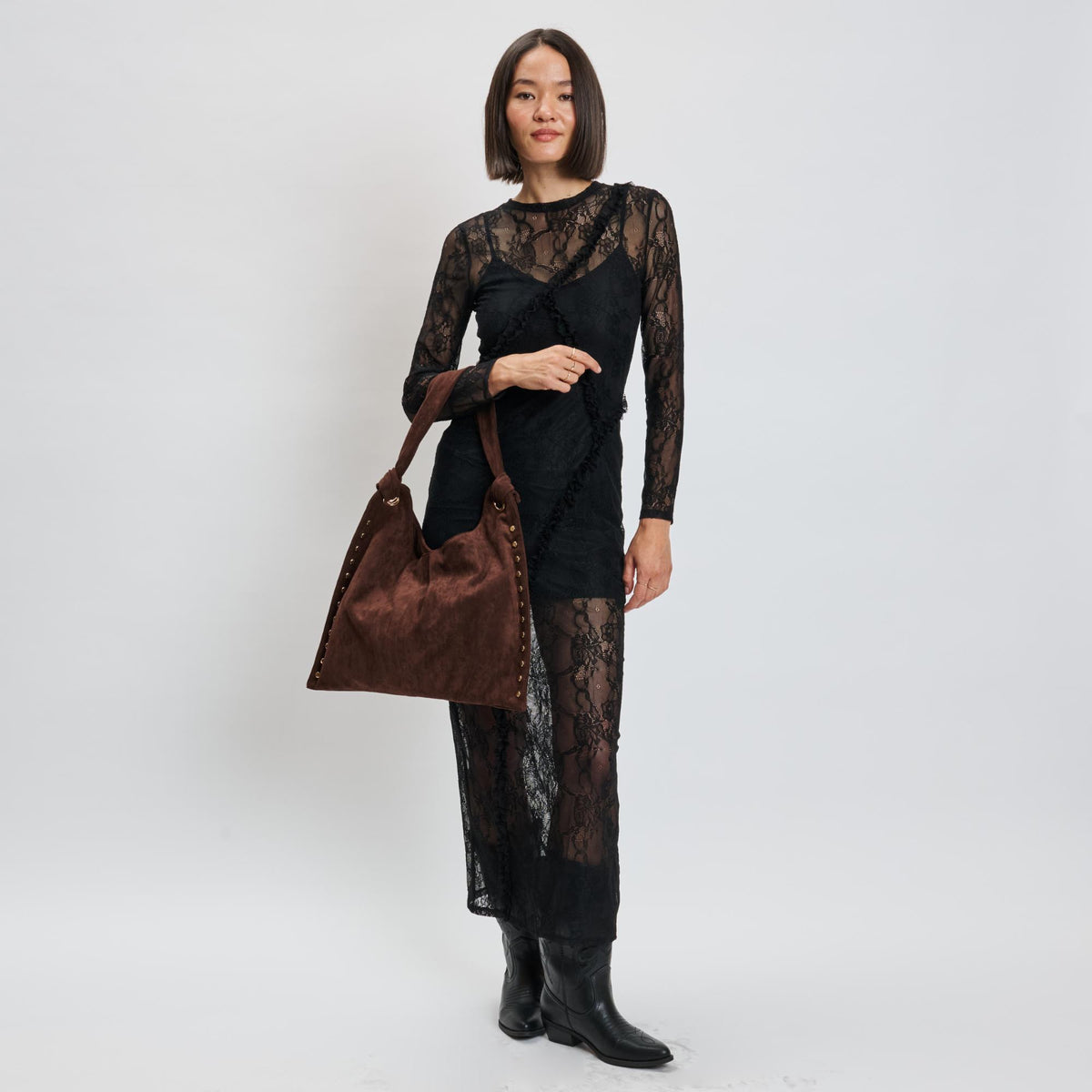 Woman wearing Chocolate Moda Luxe Meadow Hobo 842017139942 View 4 | Chocolate