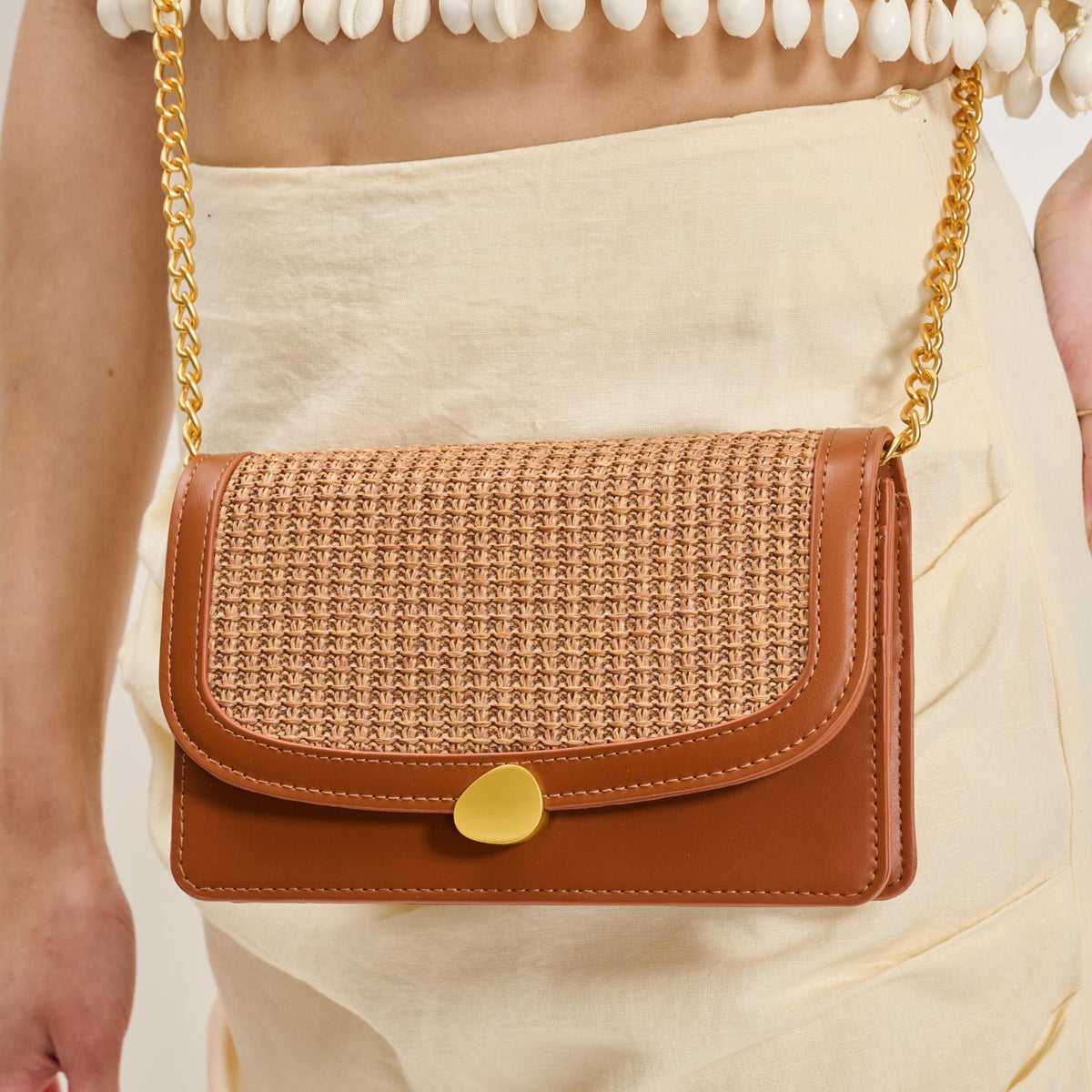 Woman wearing Tan Moda Luxe Nina Crossbody 842017137160 View 4 | Tan