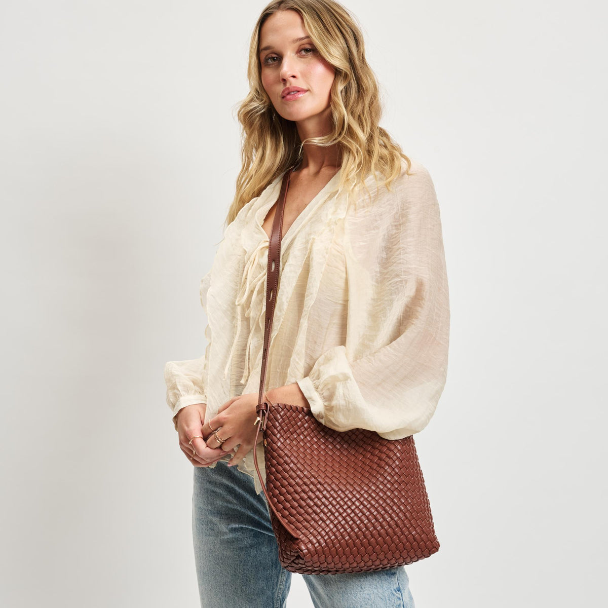 Woman wearing Chocolate Moda Luxe Isadora Bucket 842017137351 View 2 | Chocolate