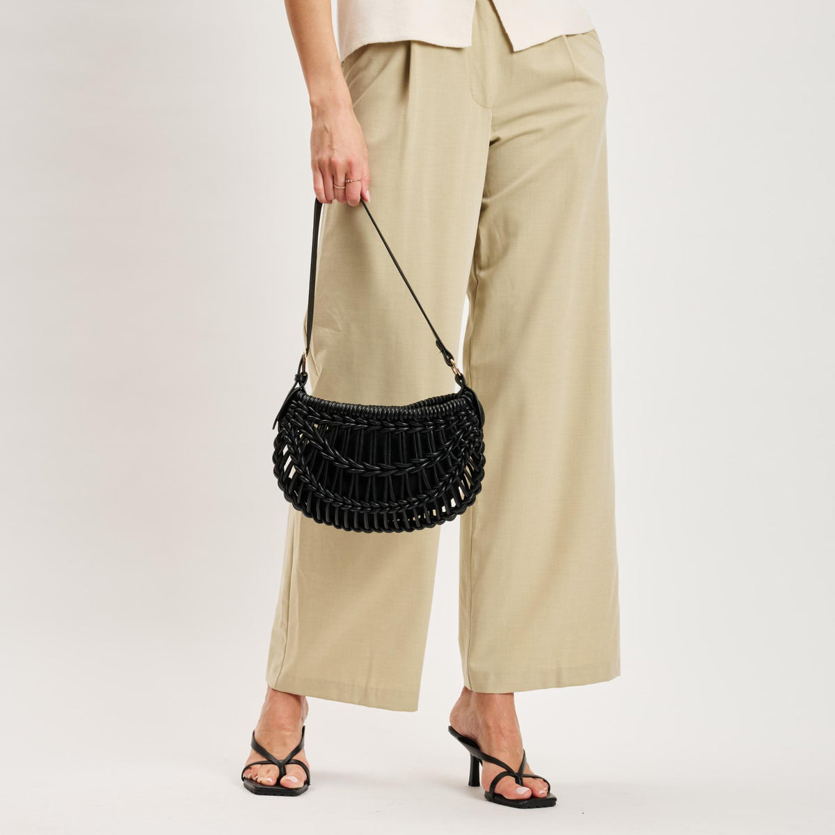Woman wearing Black Moda Luxe Francesca Clutch 842017141389 View 3 | Black
