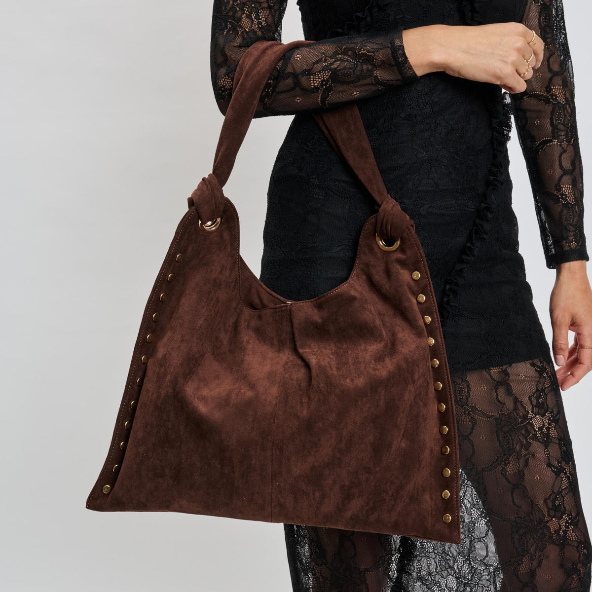 Woman wearing Chocolate Moda Luxe Meadow Hobo 842017139942 View 1 | Chocolate
