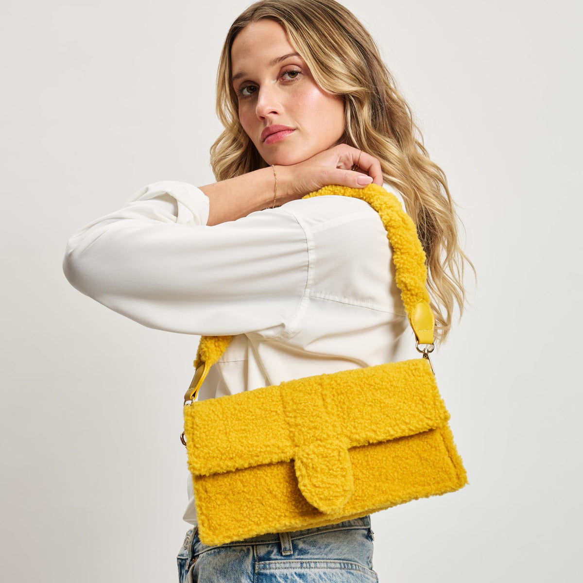 Woman wearing Mustard Moda Luxe Fergie Crossbody 842017133728 View 1 | Mustard
