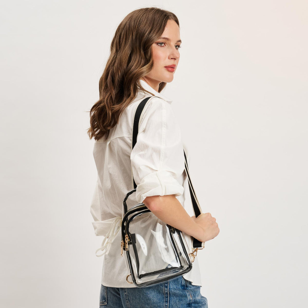 Woman wearing Clear Black Moda Luxe Britney Sling Backpack 842017133513 View 3 | Clear Black