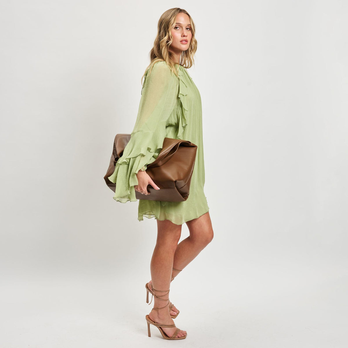 Woman wearing Chocolate Moda Luxe Faye Hobo 842017138785 View 3 | Chocolate