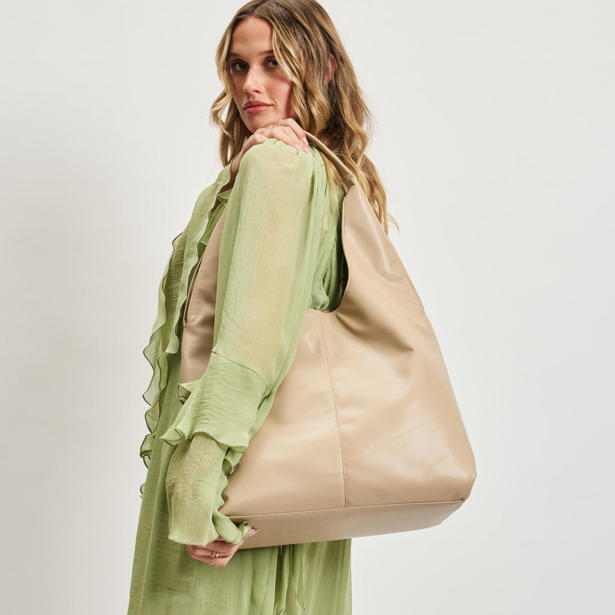 Woman wearing Natural Moda Luxe Faye Hobo 842017138761 View 1 | Natural