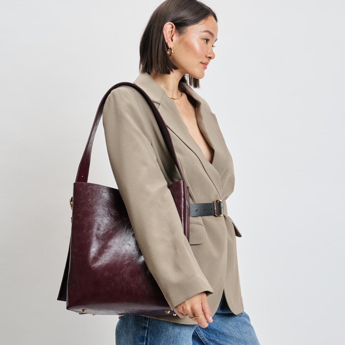 Woman wearing Burgundy Moda Luxe Brooke Bucket 842017139522 View 2 | Burgundy