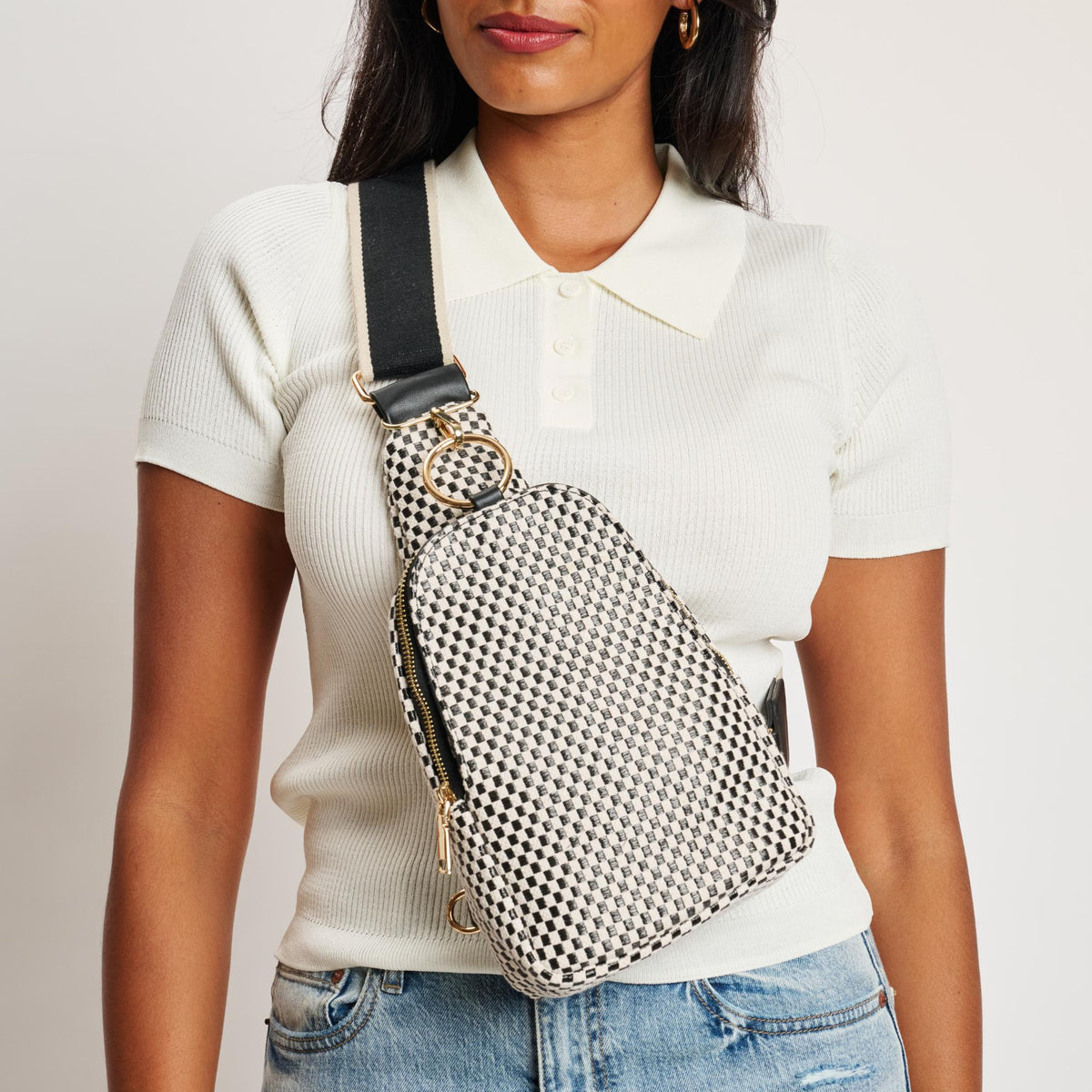 Woman wearing Black White Moda Luxe Regina - Checkered Sling Backpack 842017136194 View 1 | Black White