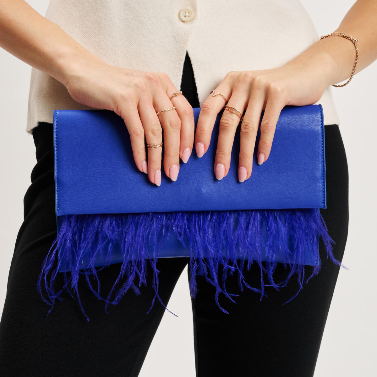 Woman wearing Electric Blue Moda Luxe Everlee Clutch 842017131144 View 1 | Electric Blue