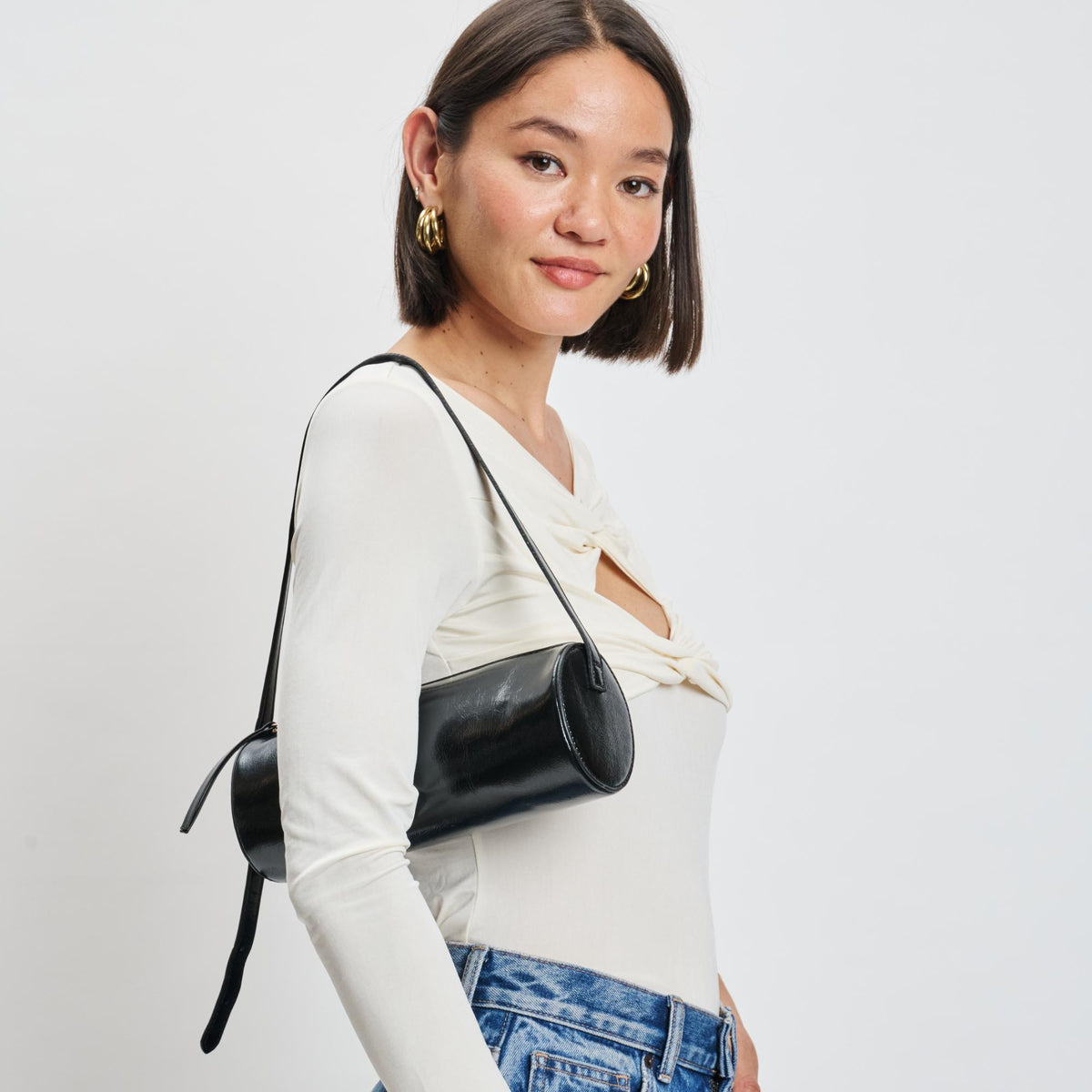 Woman wearing Black Moda Luxe Mila Shoulder Bag 842017139270 View 1 | Black