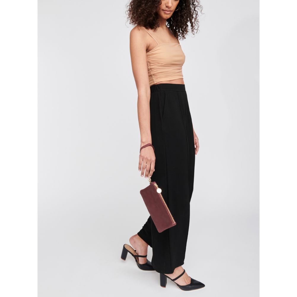 Woman wearing Burgundy Moda Luxe Olivia Wristlet 842017117926 View 3 | Burgundy