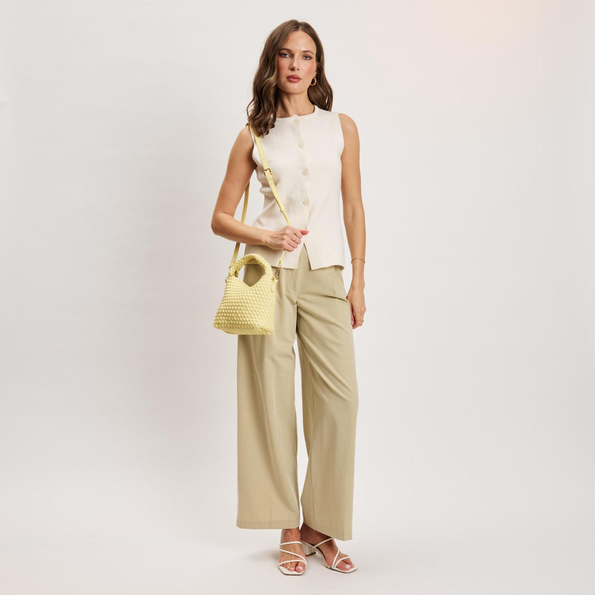 Woman wearing Butter Moda Luxe Jessamine Crossbody 842017141310 View 3 | Butter