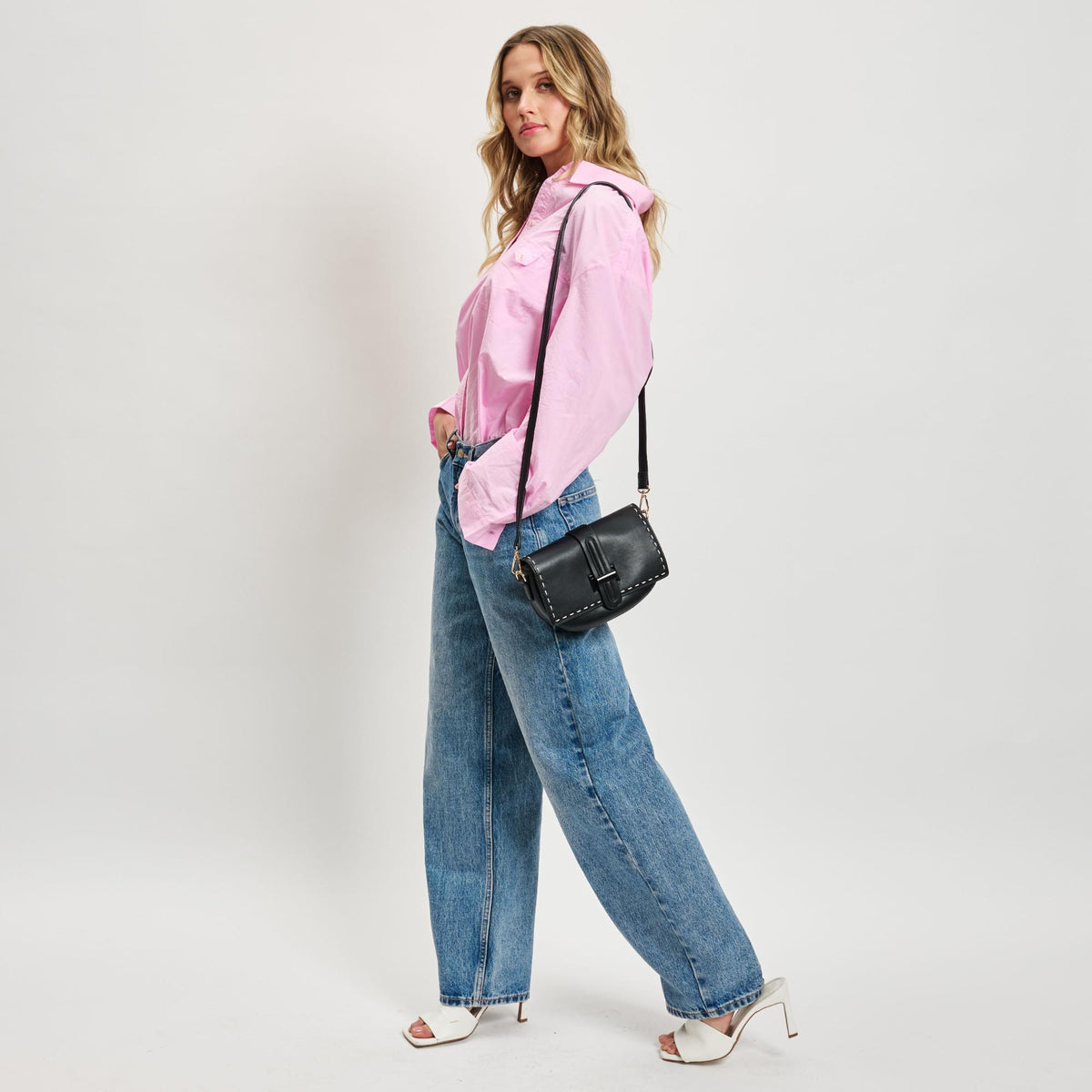 Woman wearing Black Moda Luxe Norah Crossbody 842017133650 View 4 | Black