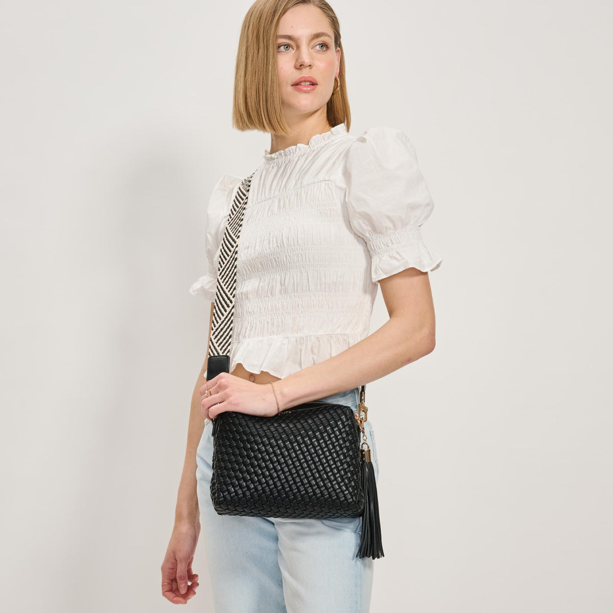 Woman wearing Black Moda Luxe Roxana Crossbody 842017137450 View 1 | Black