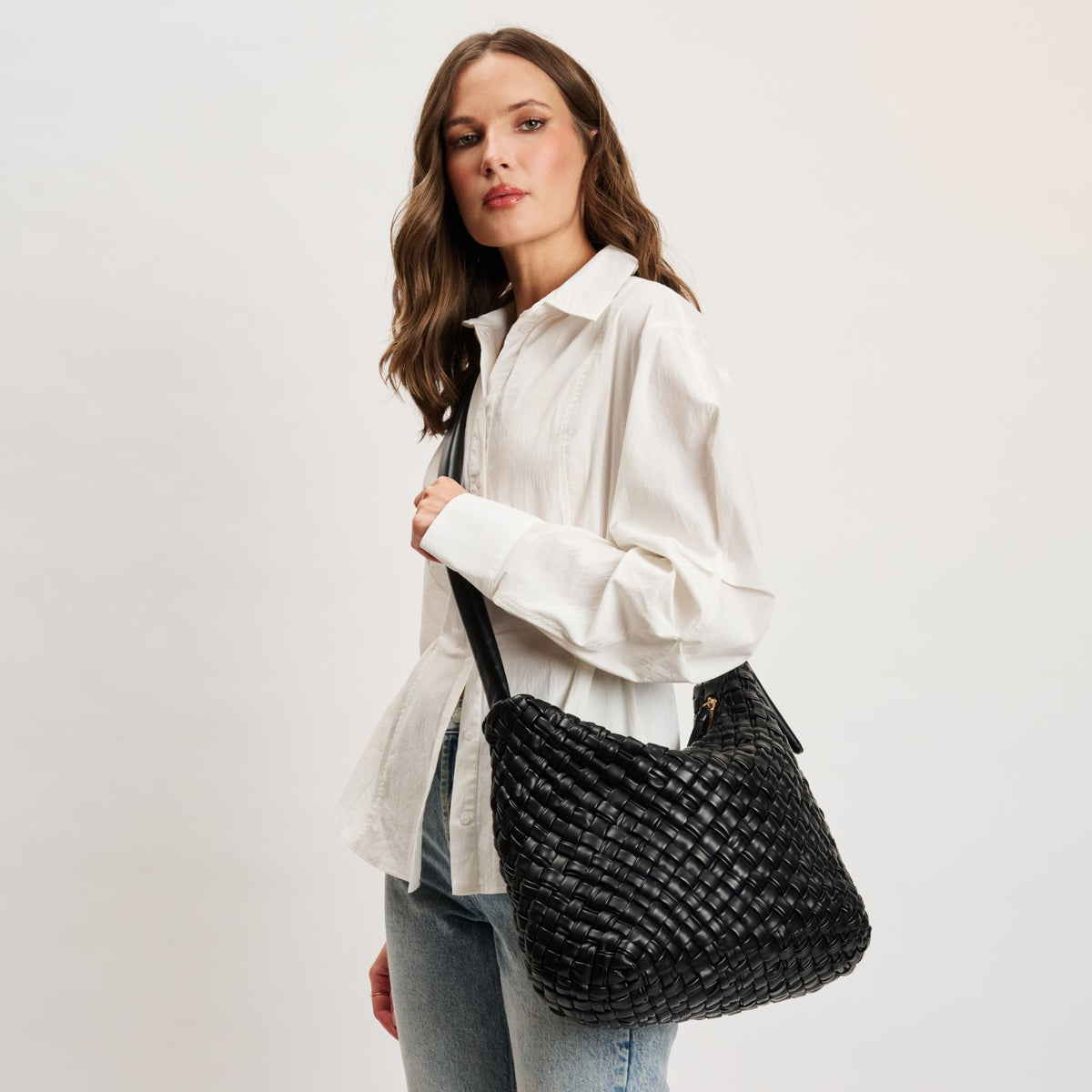 Woman wearing Black Moda Luxe Classica Crossbody 842017135470 View 1 | Black