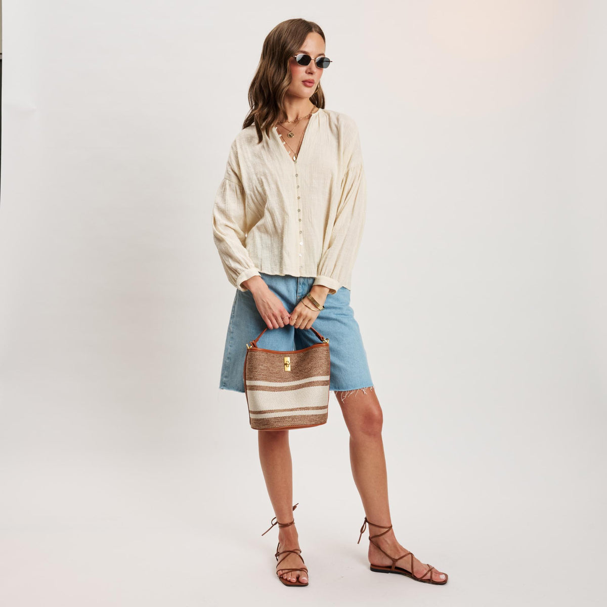 Woman wearing Tan Moda Luxe Mirella Bucket 842017141402 View 4 | Tan