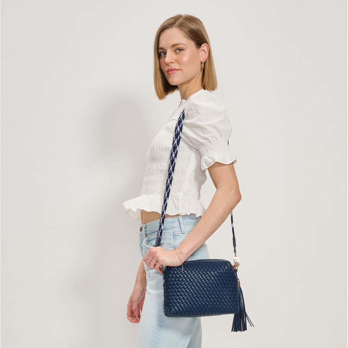 Woman wearing Navy Moda Luxe Roxana Crossbody 842017137467 View 1 | Navy