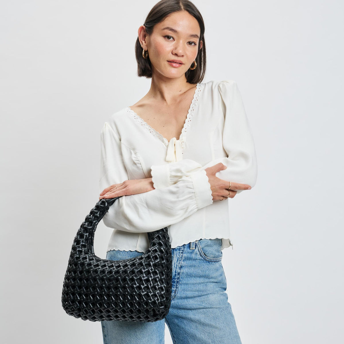 Woman wearing Black Moda Luxe Richelle Hobo 842017137511 View 1 | Black