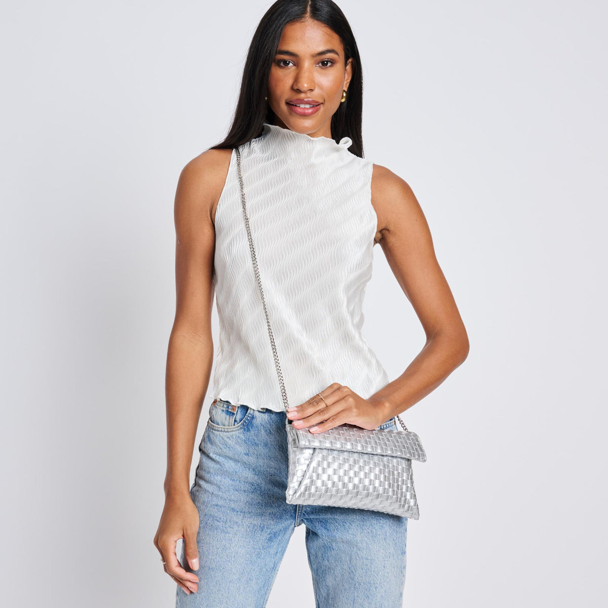 Woman wearing Silver Moda Luxe Priscilla Clutch 842017136569 View 2 | Silver