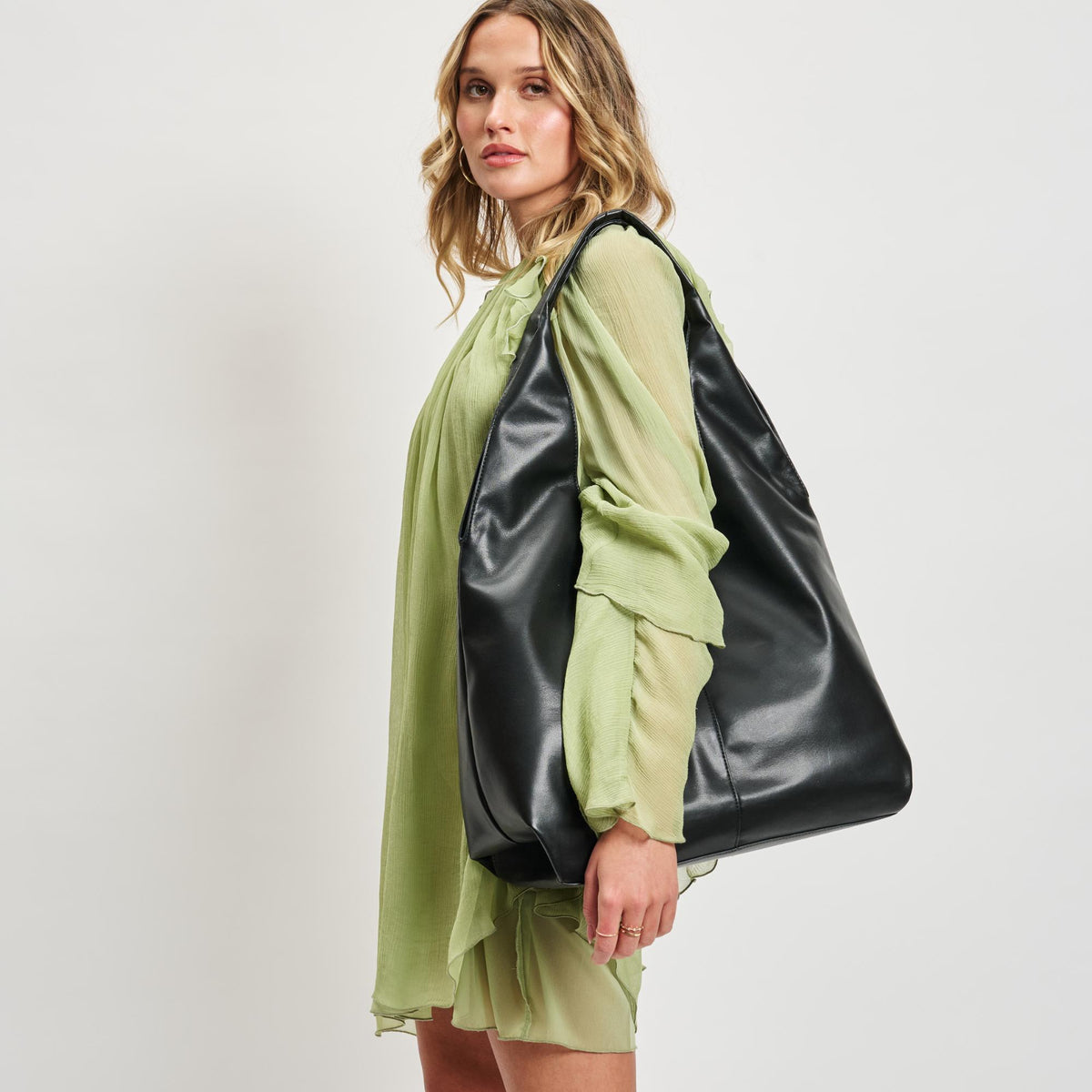 Woman wearing Black Moda Luxe Faye Hobo 842017138754 View 2 | Black