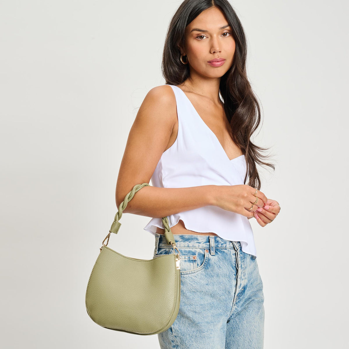 Woman wearing Sage Moda Luxe Glamique Crossbody 842017134862 View 2 | Sage