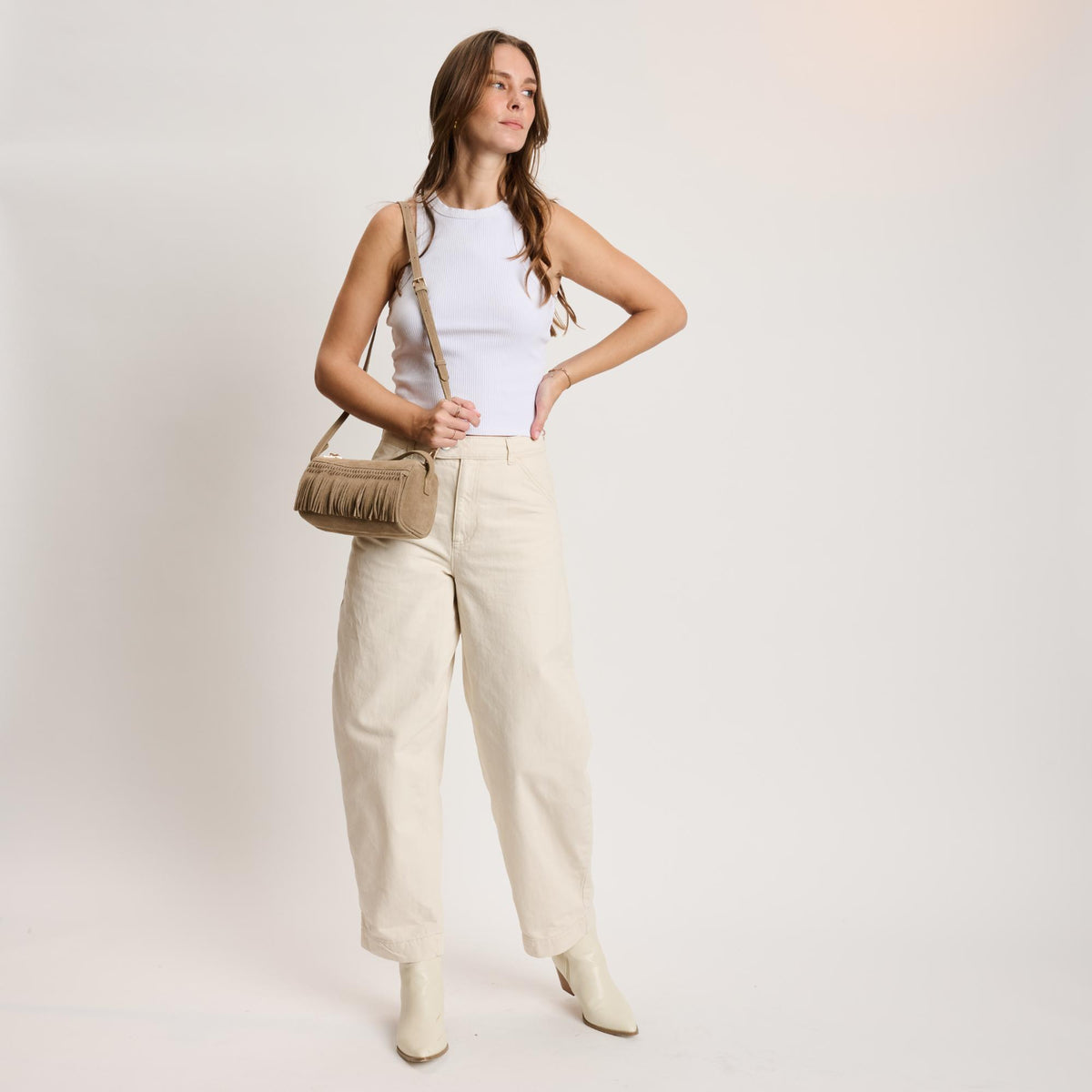 Woman wearing Sand Moda Luxe Emmi Shoulder Bag 842017140481 View 2 | Sand