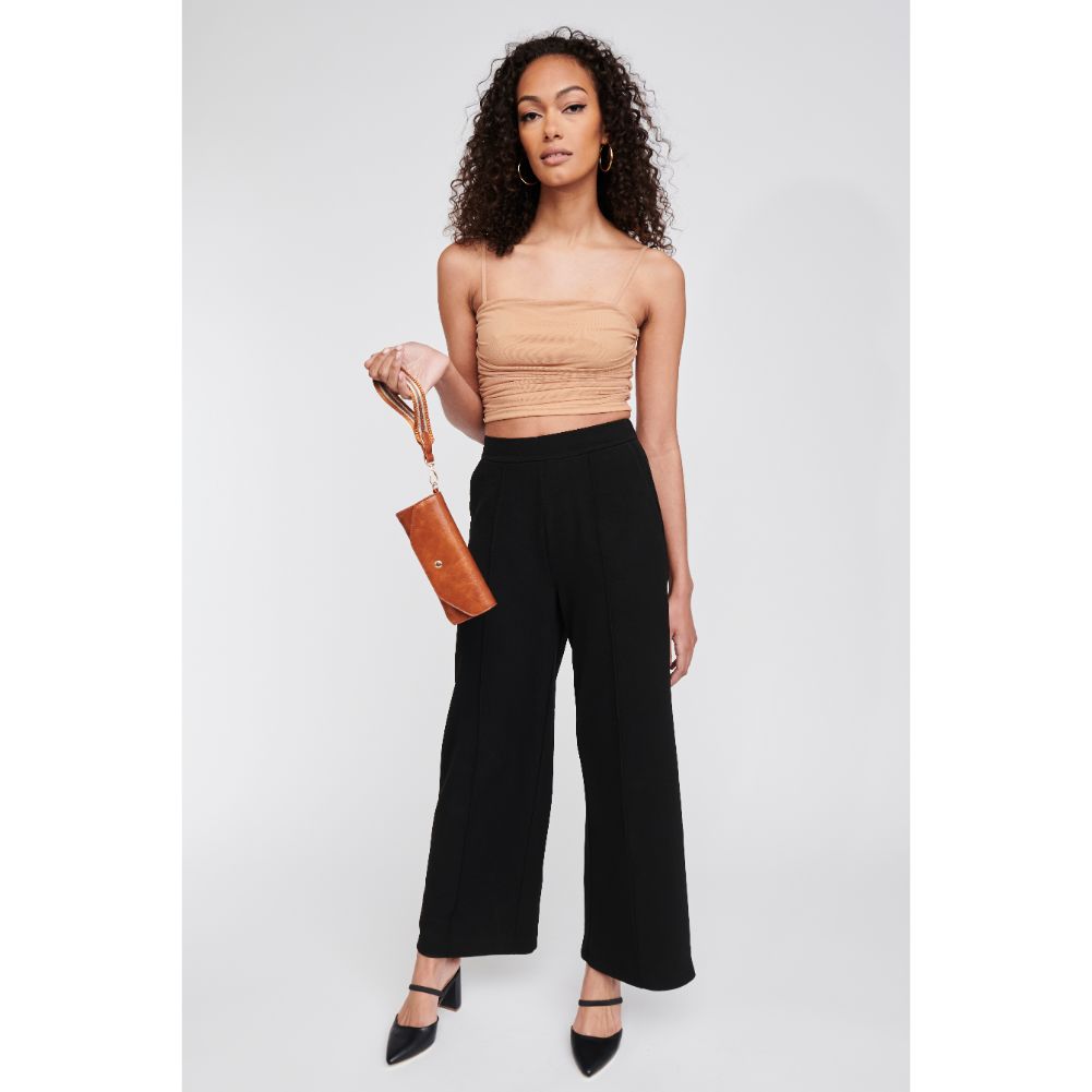 Woman wearing Tan Moda Luxe Kaya Wristlet 842017126928 View 2 | Tan
