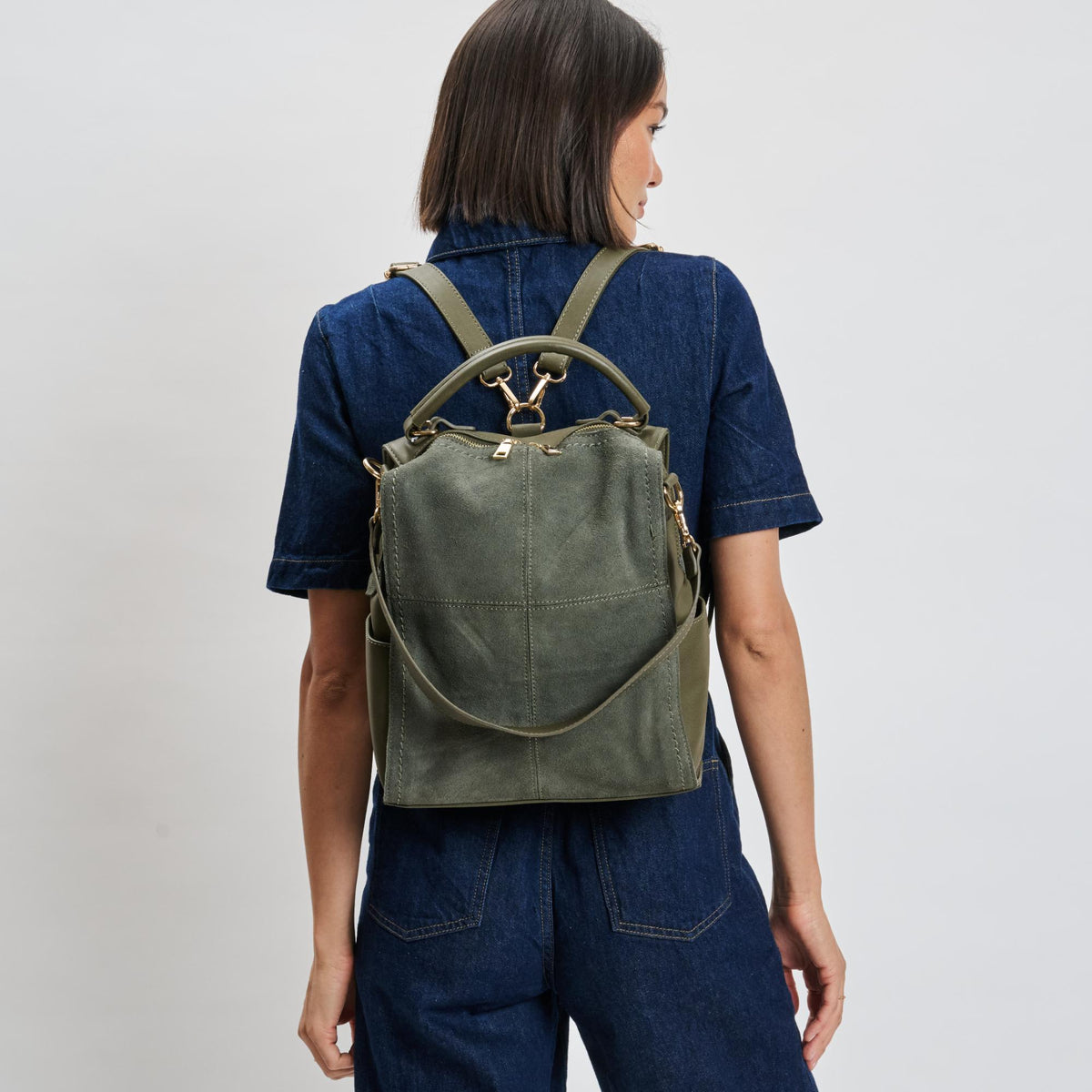 Woman wearing Olive Moda Luxe Brette Backpack 842017114697 View 1 | Olive
