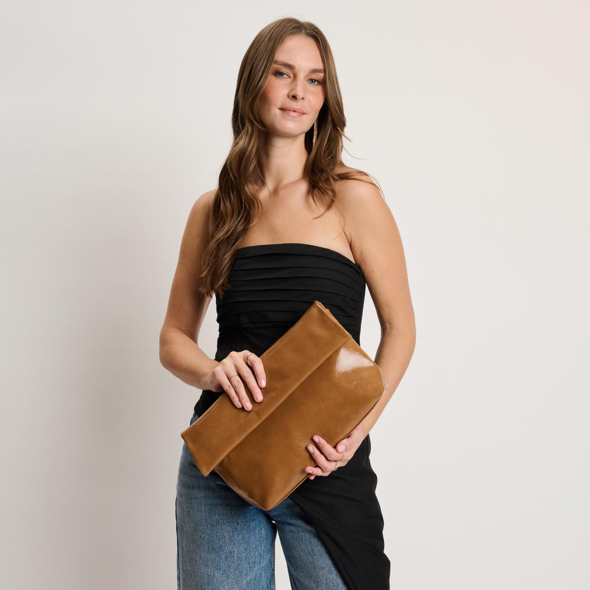 Woman wearing Caramel Moda Luxe Angela Crossbody 842017141662 View 1 | Caramel
