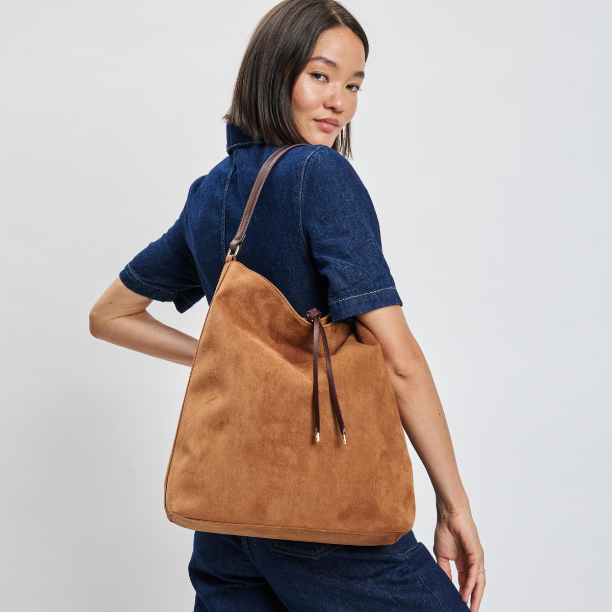 Woman wearing Cognac Moda Luxe Felicity Hobo 842017139362 View 1 | Cognac