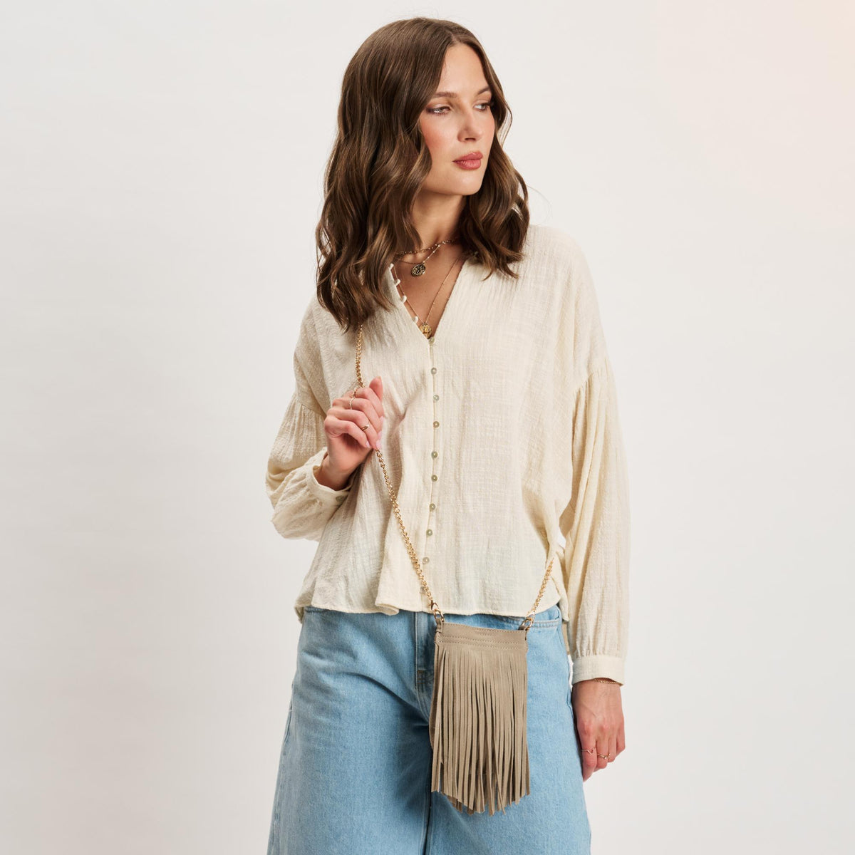 Woman wearing Sand Moda Luxe River Evening Bag 842017140535 View 1 | Sand