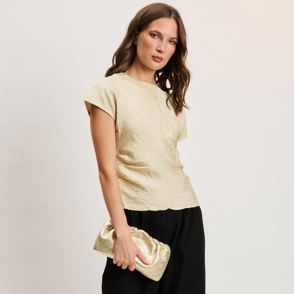 Woman wearing Gold Moda Luxe Fancy Clutch 842017141334 View 1 | Gold